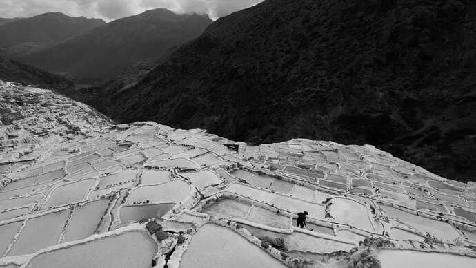 Salt wells on a hillside in the Salt Mines of Maras in Peru.